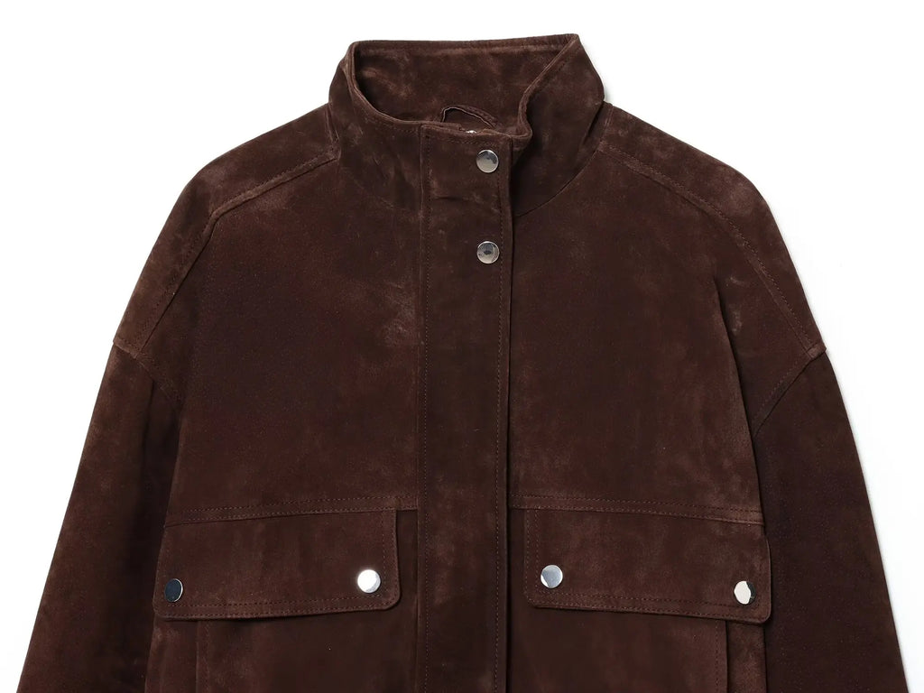 Chaqueta ajustada de cuello alto con cremallera y bolsillos