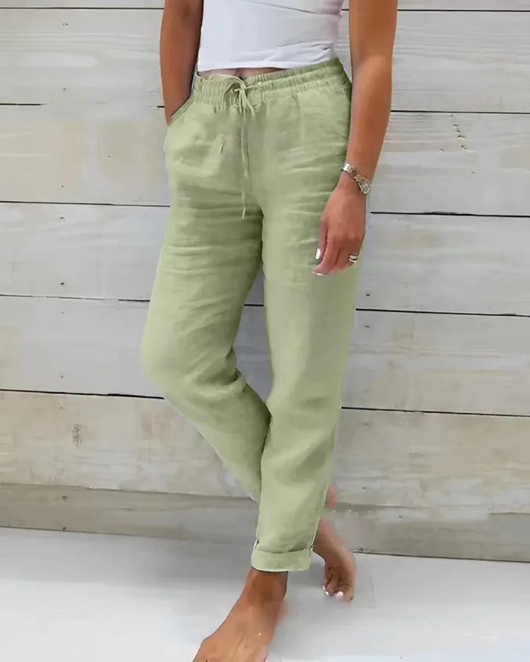 Pantalón pitillo con cintura elástica y pinzas