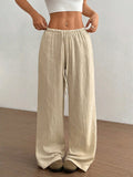 Pantalón de algodón con cordón y pierna ancha